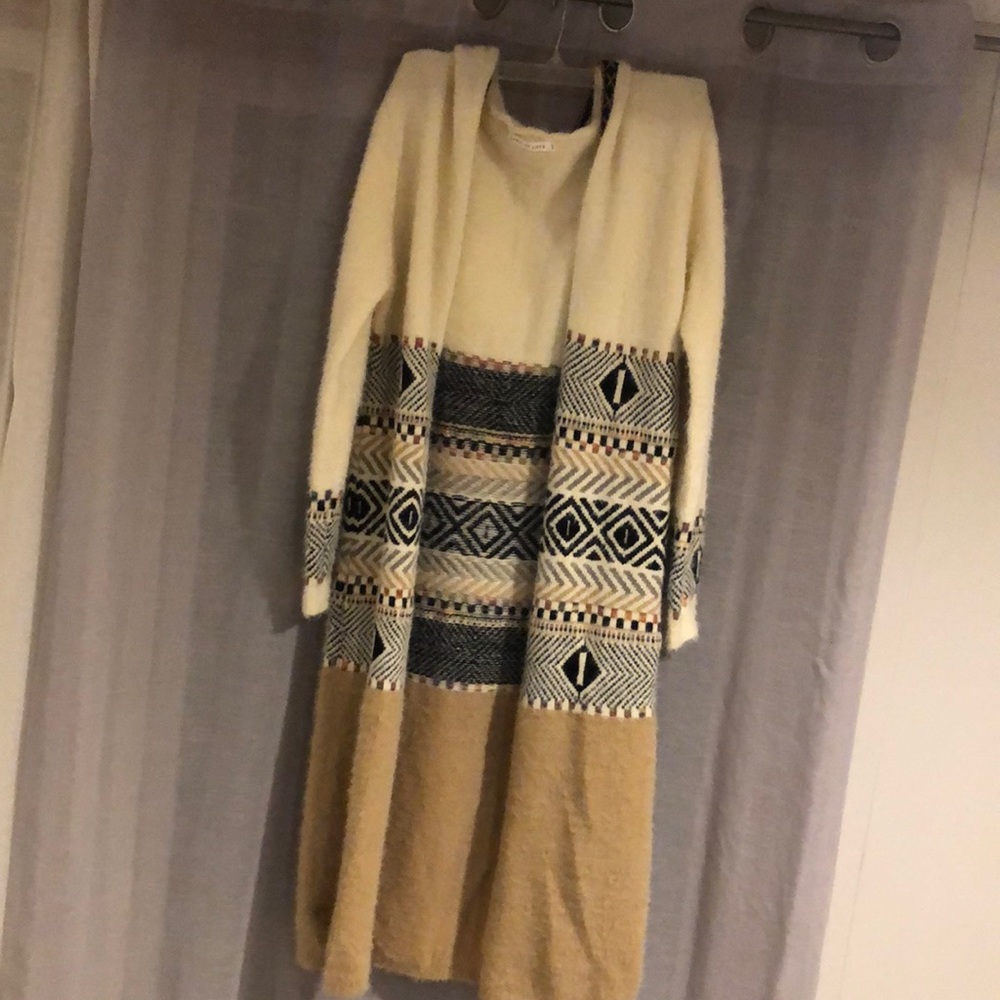 NWOT label of love thick long hooded duster. Designed in Australia